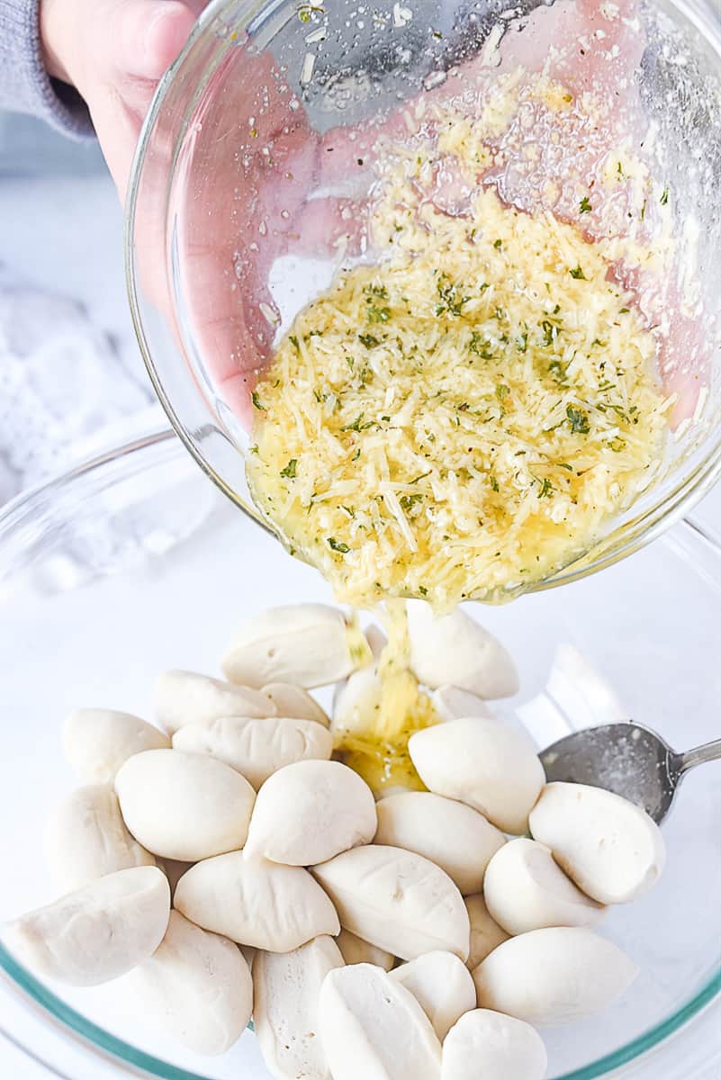 pouring cheese mixture over dough