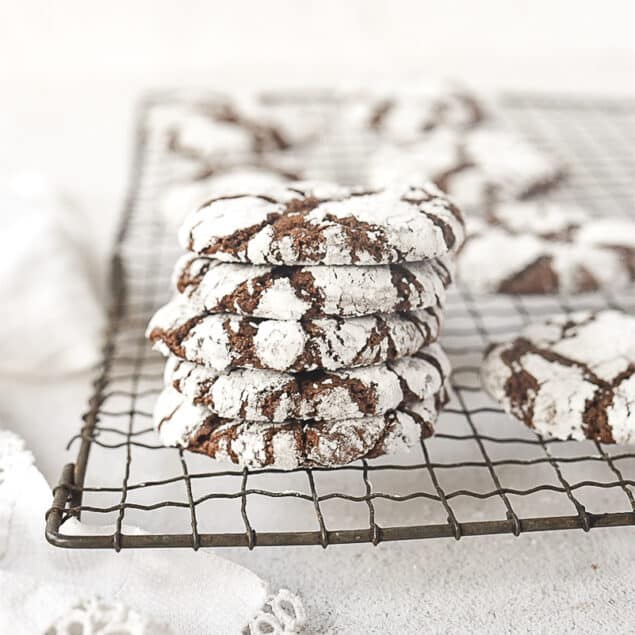 chocolate crinkle cookies on a cooling rack