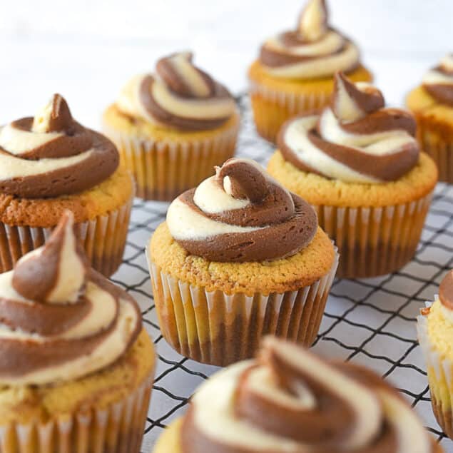 chocolate peanut butter cupcakes on a cooling rack