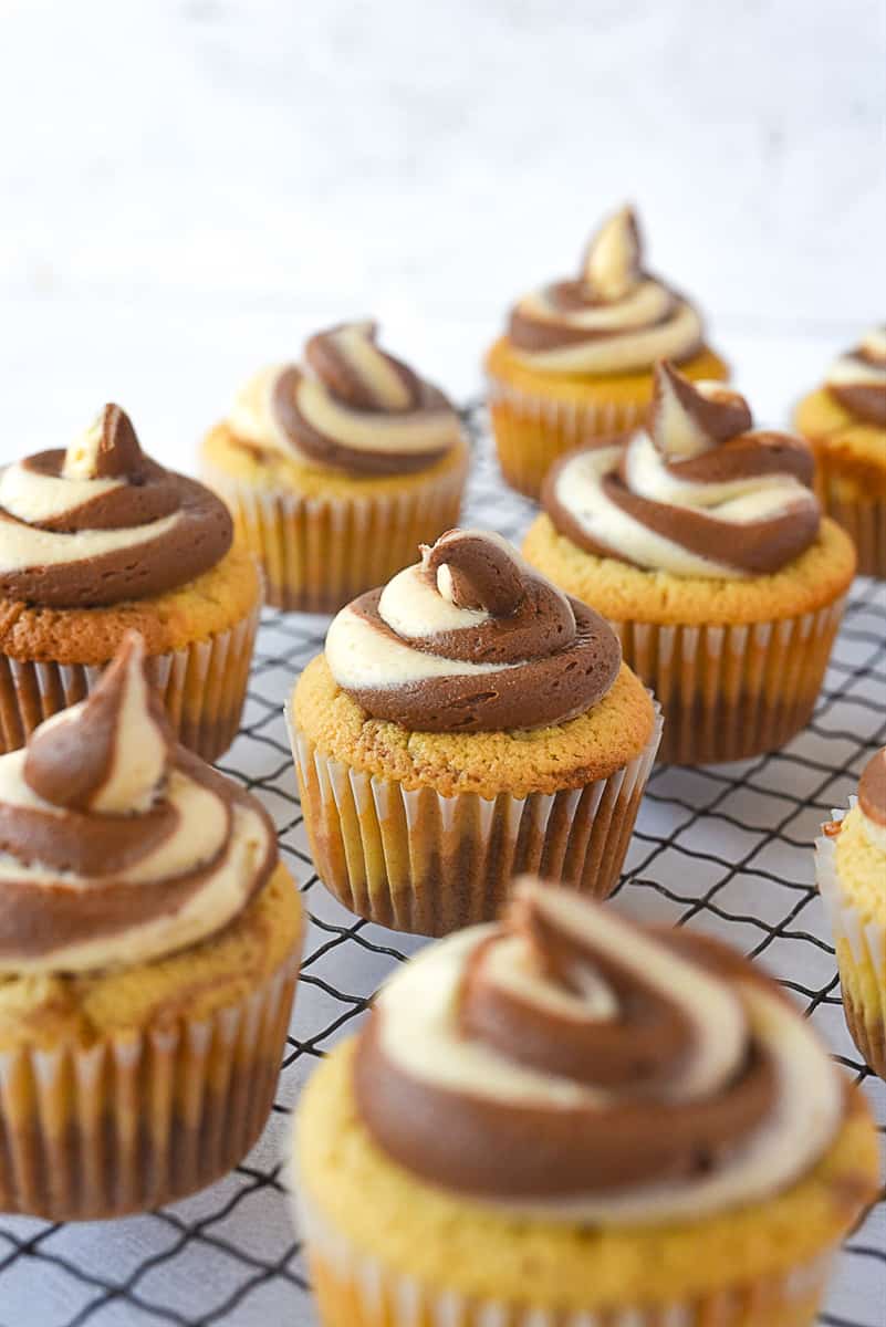 chocolate peanut butter cupcakes on a cooling rack