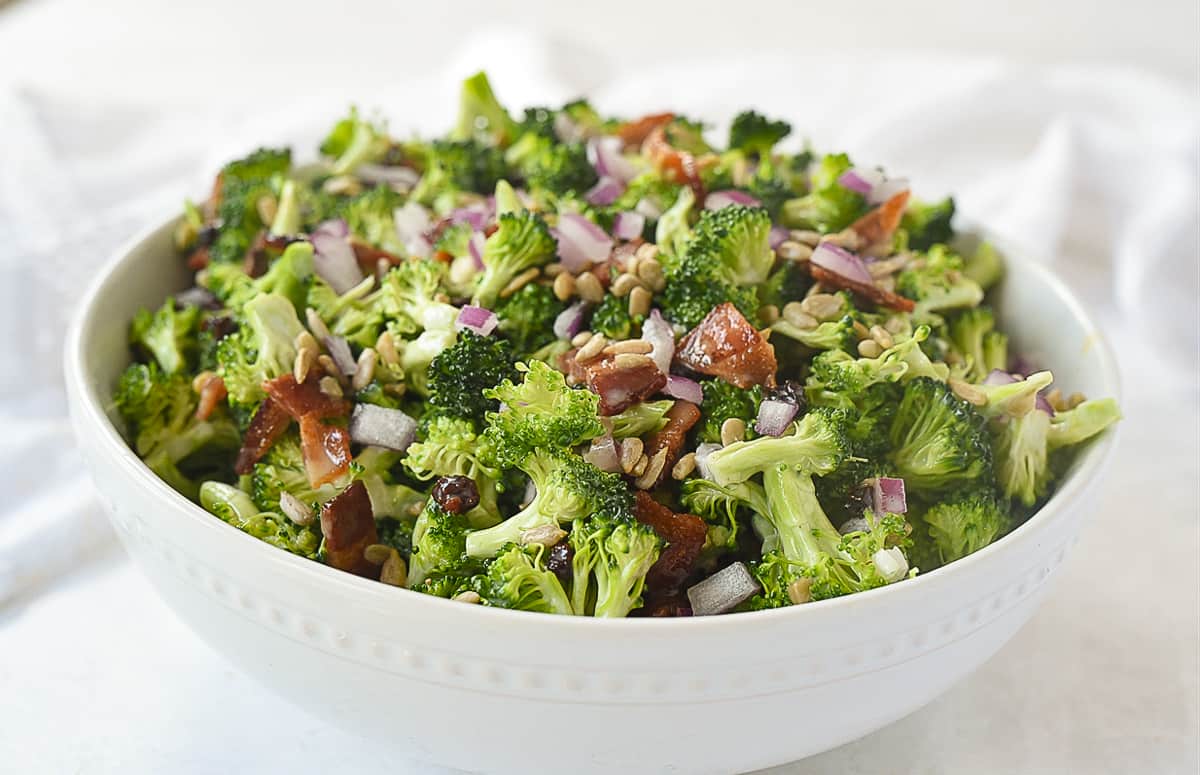 white bowl of broccoli salad