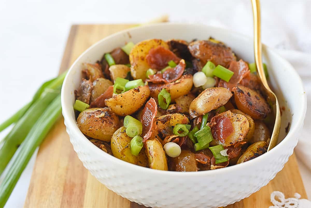 white bowl of potatoes