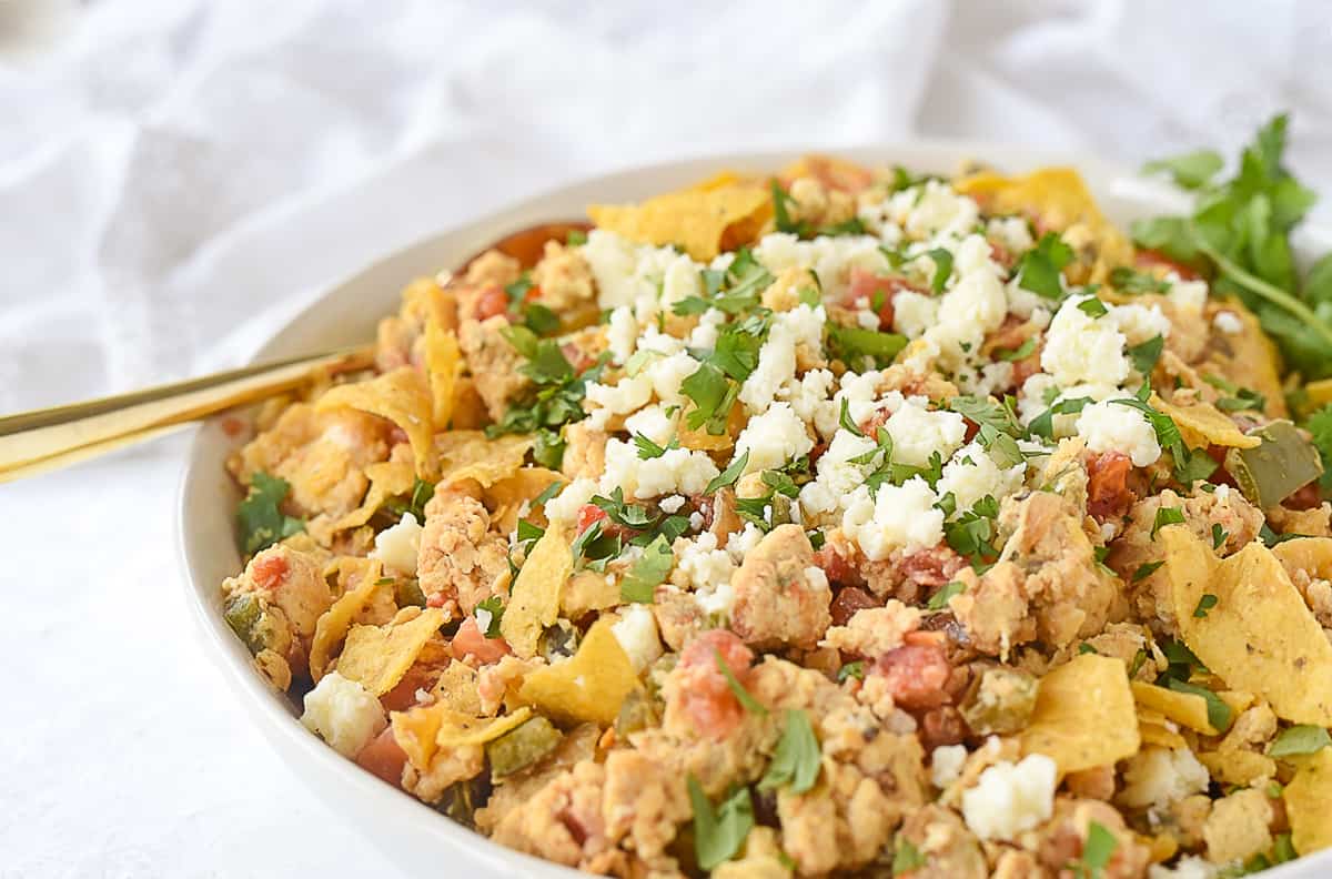 bowl of migas  with a spoon