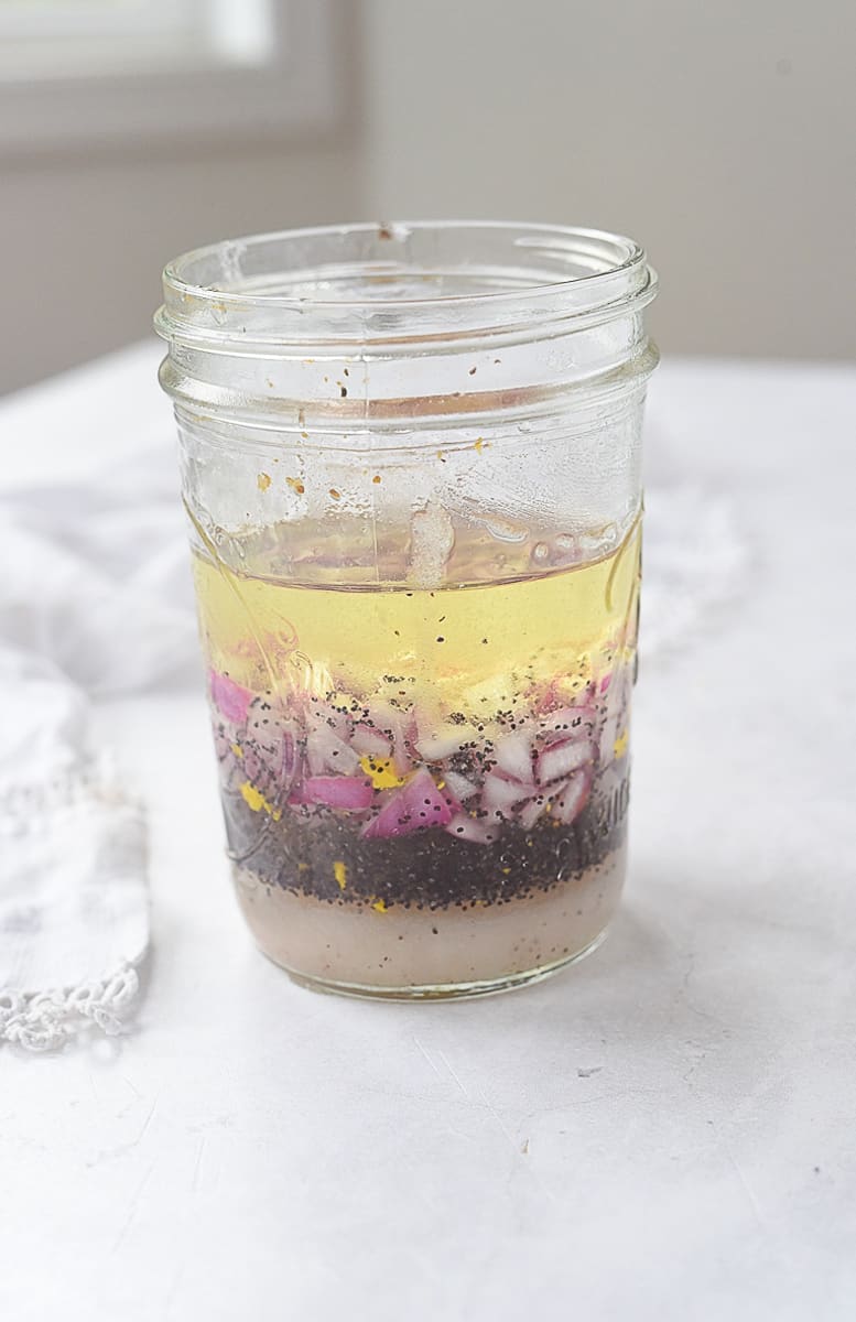 spinach salad dresing in a jar.