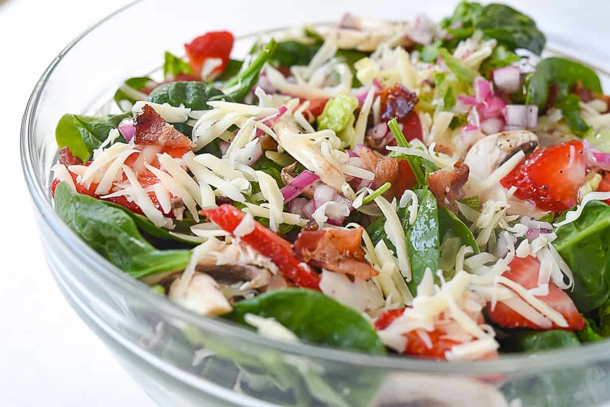 spinach salad in a bowl