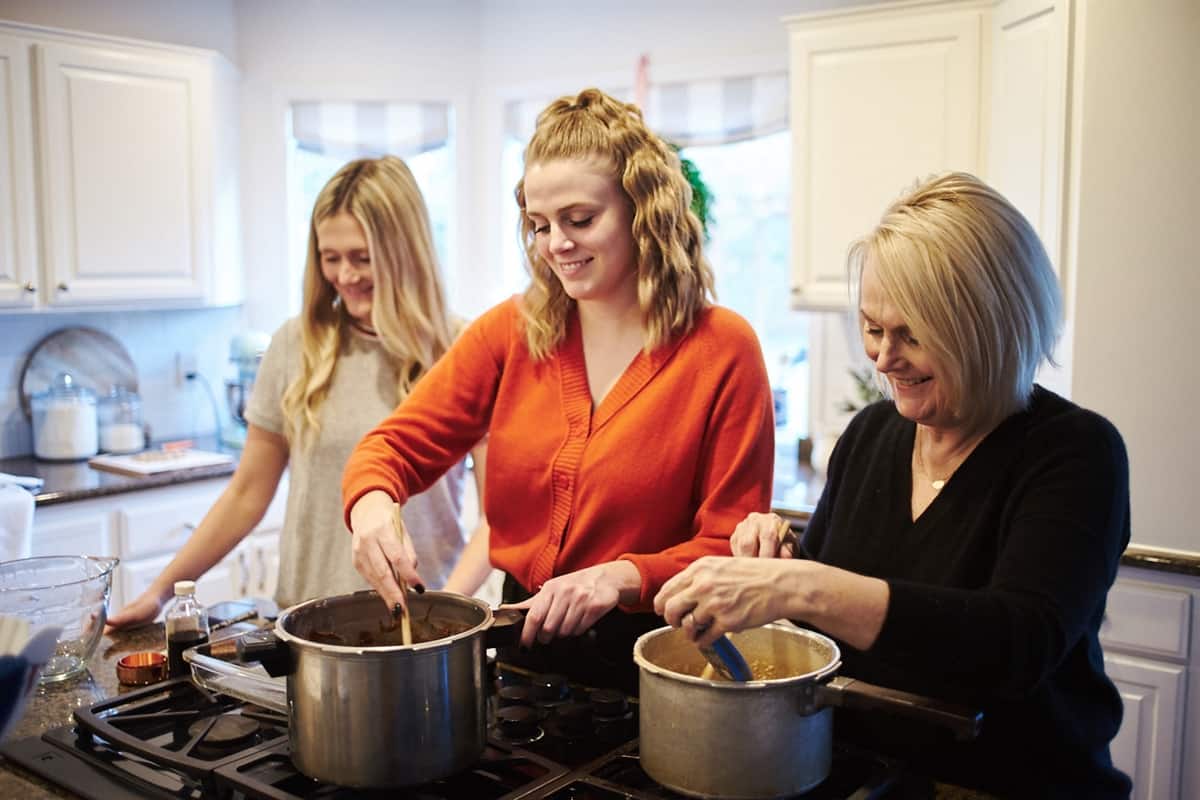 mother and daughters cooking