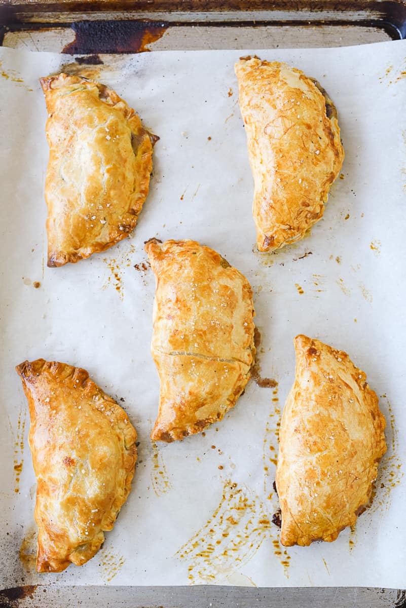 baked cornish pastry on baking sheet