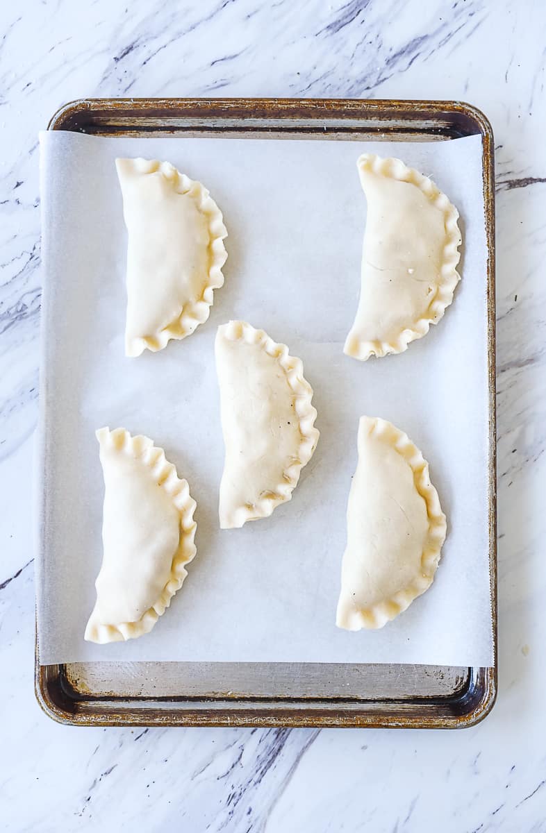 cornish pastry on baking sheet ready to bake