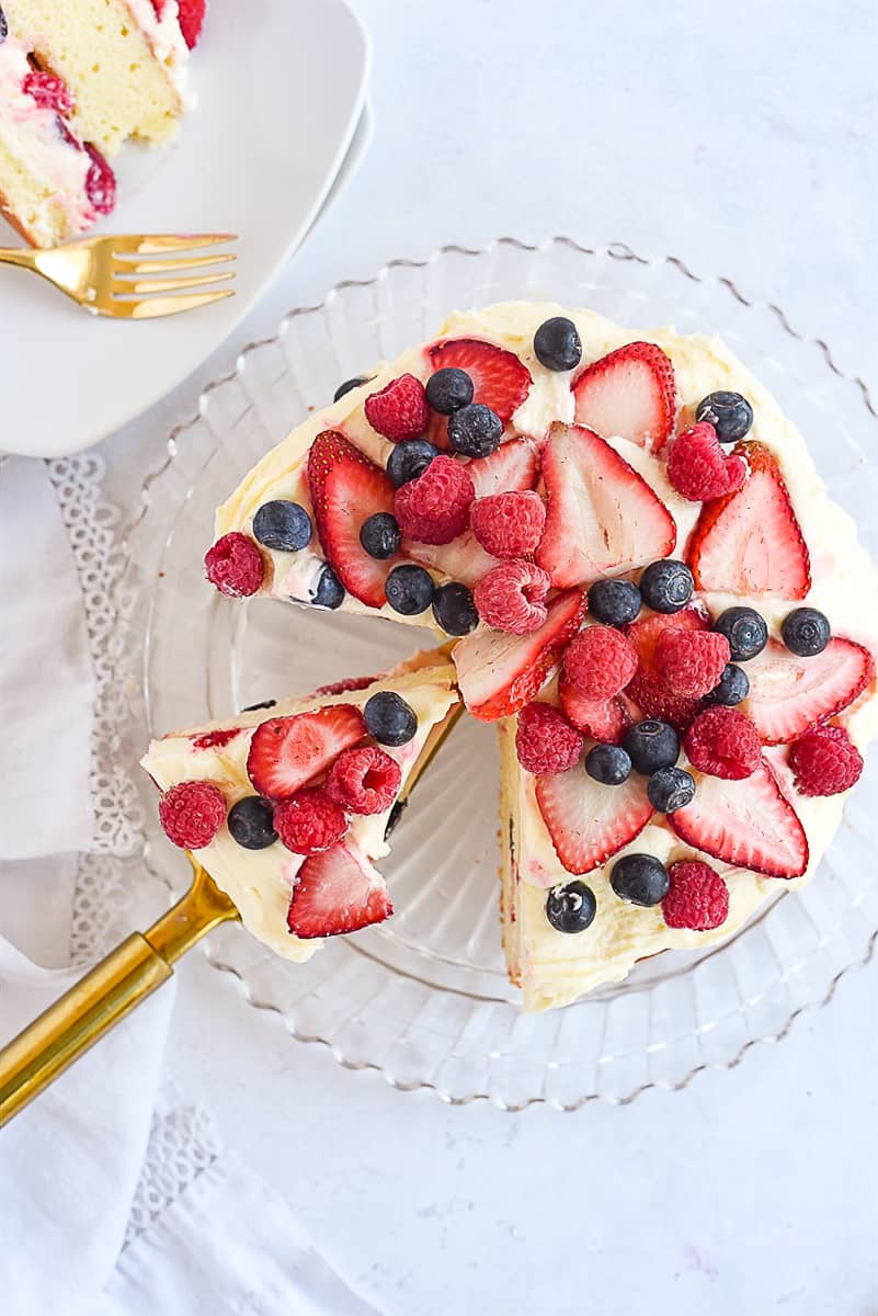 overhed shot of a sliced lemon berry cake