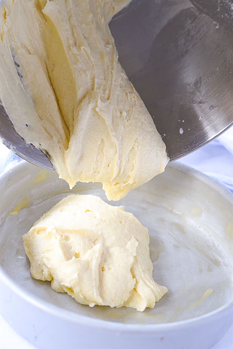 pouring batter into cake pan