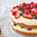 Lemon berry cake with fresh berries on top