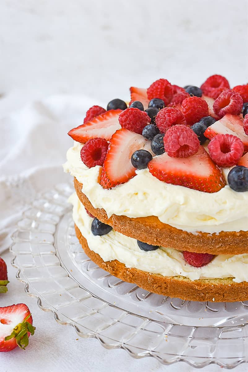 Lemon berry cake with fresh berries on top