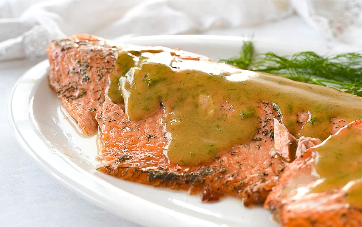 salmon with sauce on top