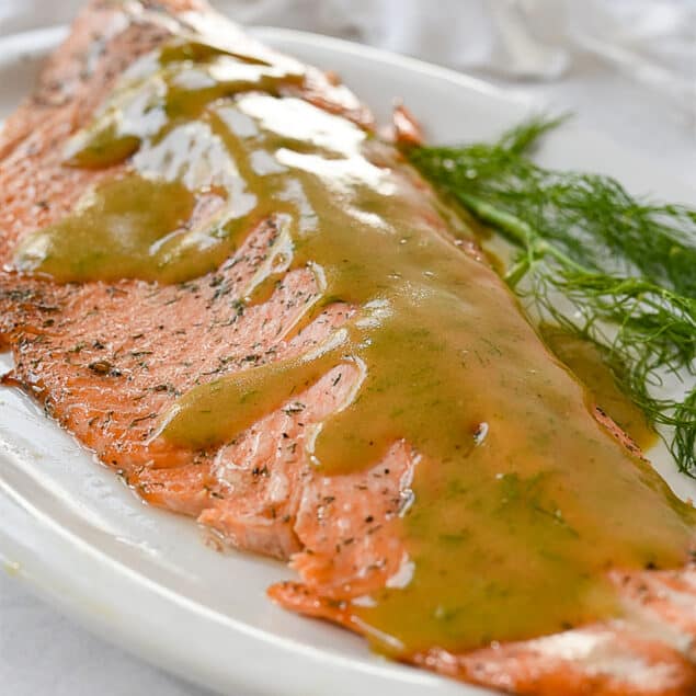 marinated salmon with sauce on top