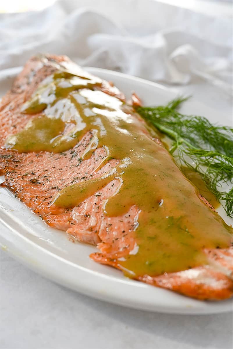 marinated salmon with sauce on top