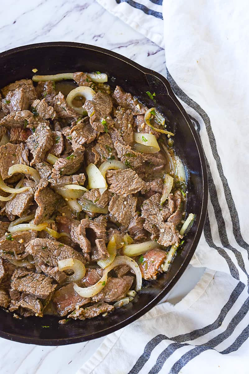 gyro meat in a cast iron pan