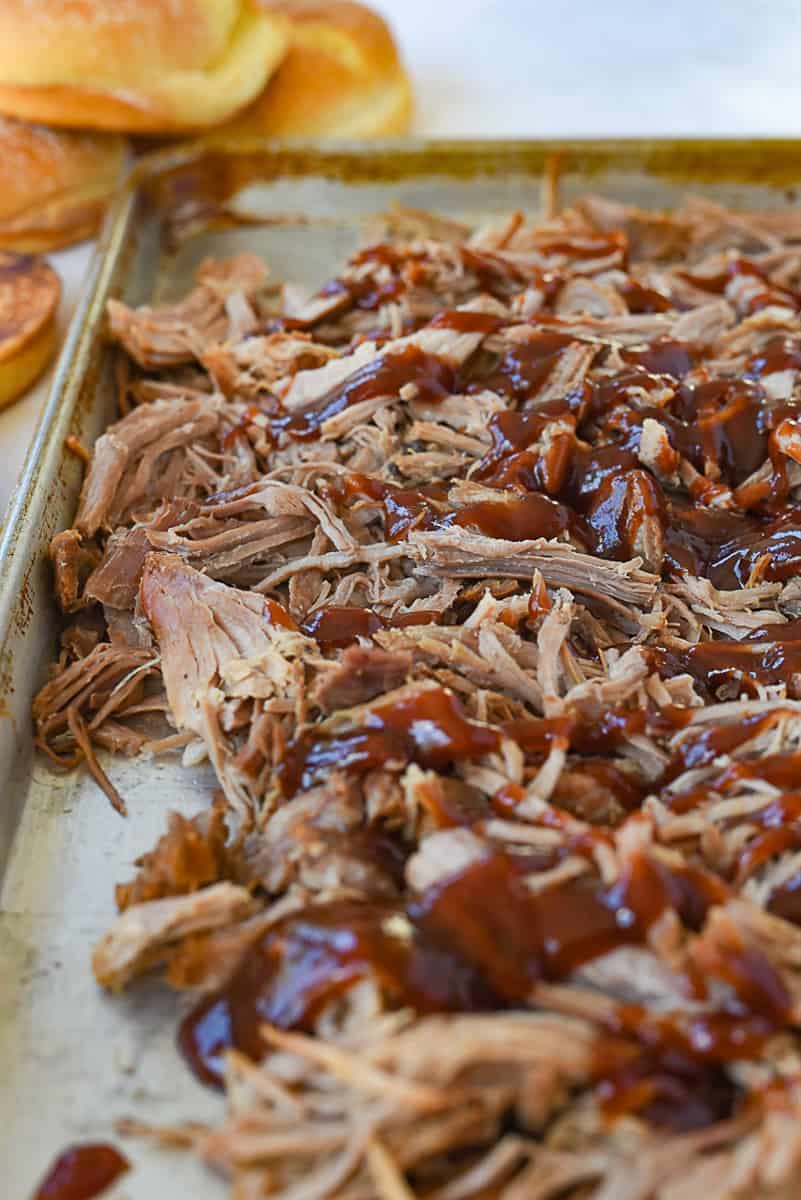 BBQ pork shredded on a baking sheet