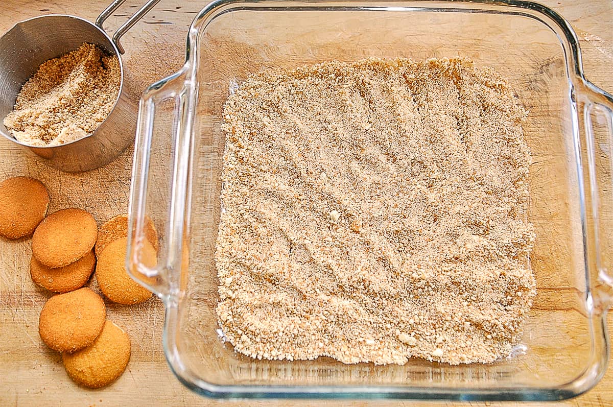 crushed vanilla wafers in bottom of pan