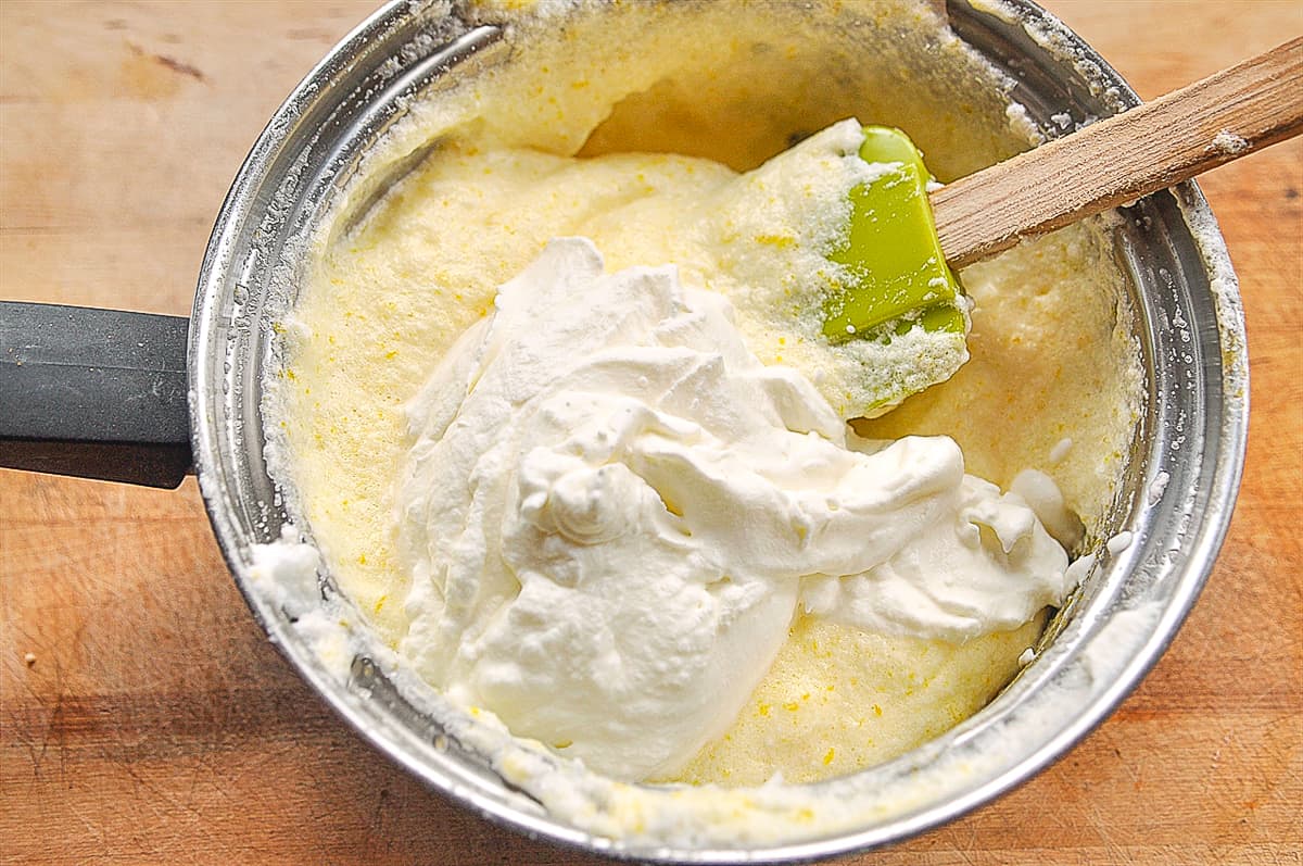 folding whipped cream into pan