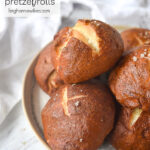 pretzel rolls on a plate