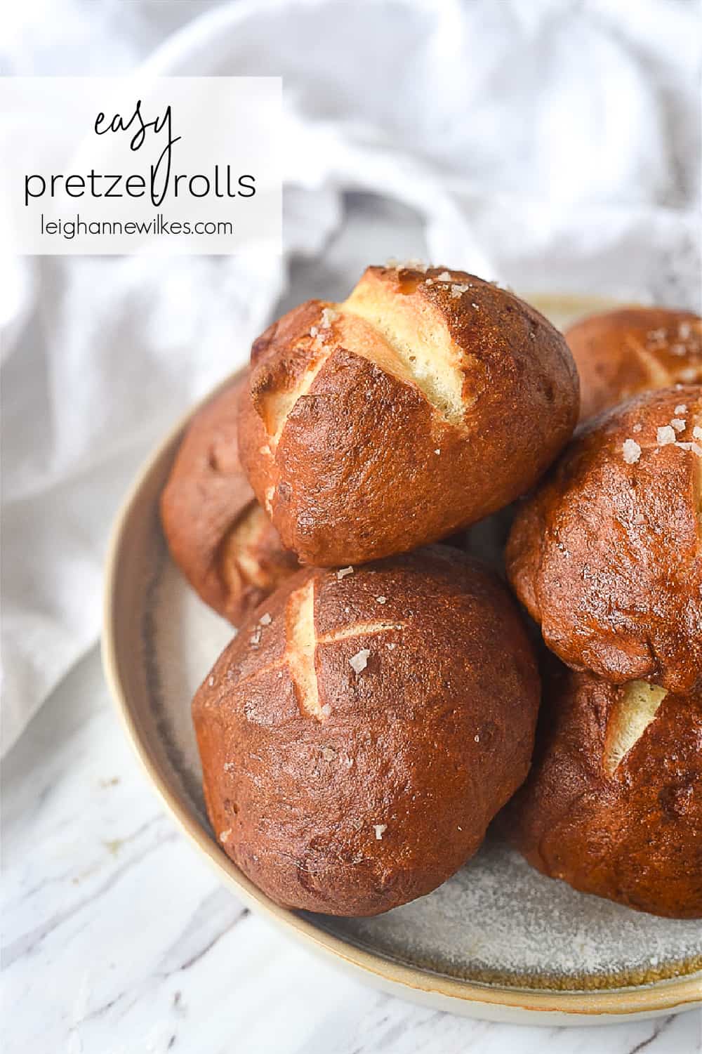 pretzel rolls on  a plate