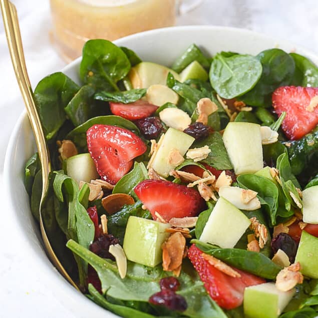 bowl of spinach fruit salad