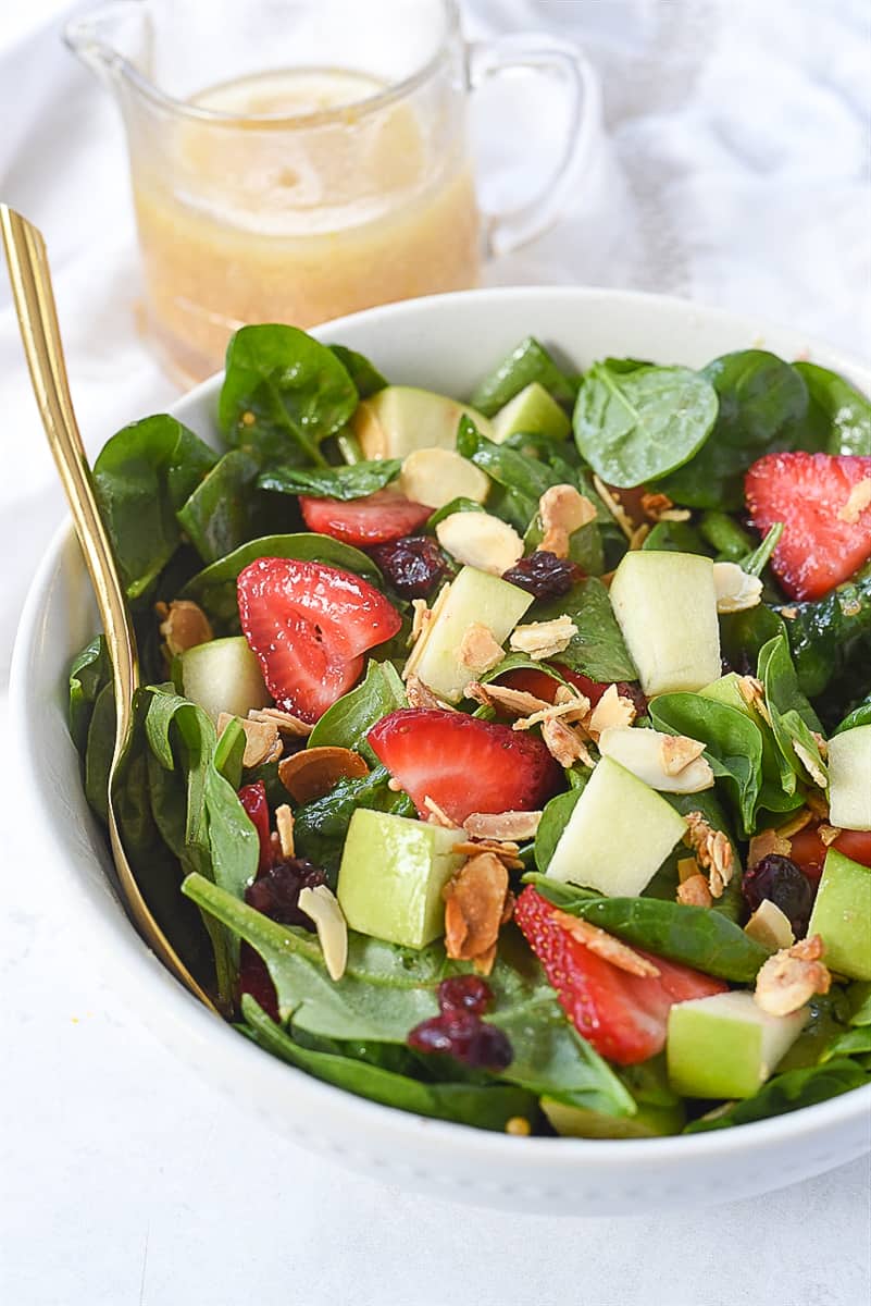 bowl of spinach fruit salad