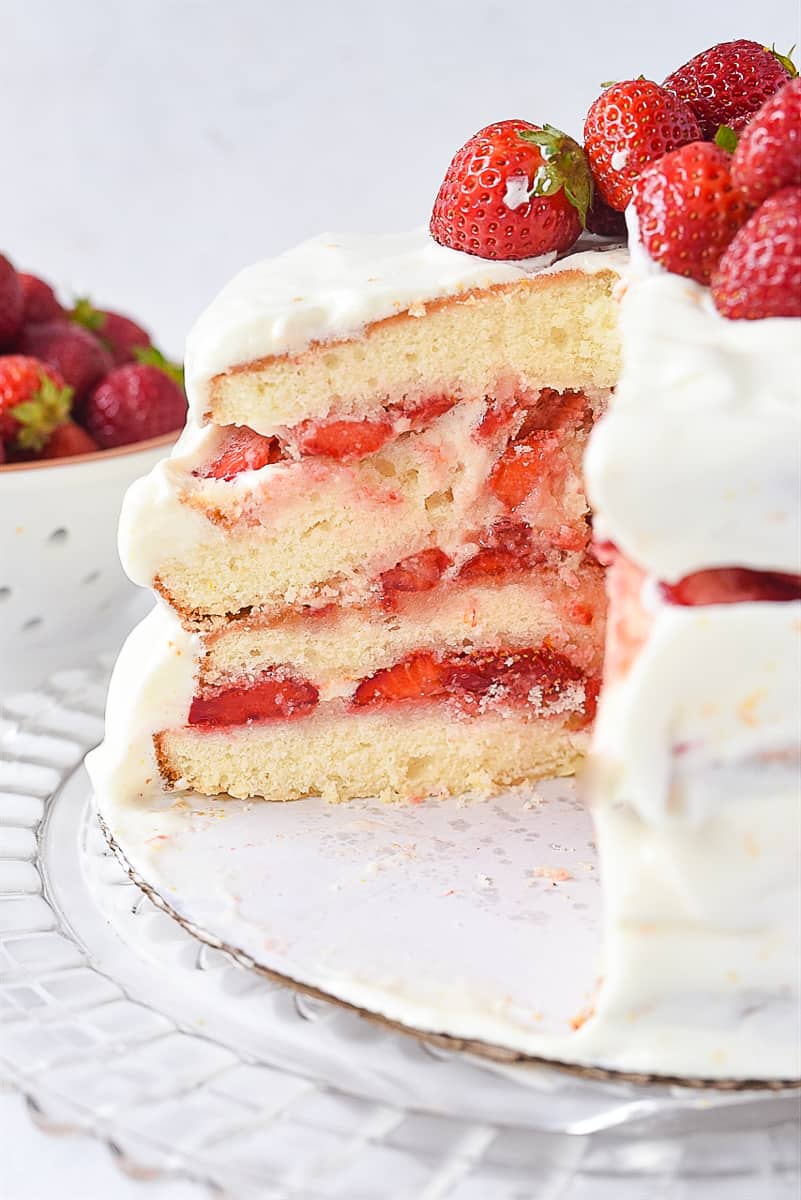 sliced strawberry layer cake