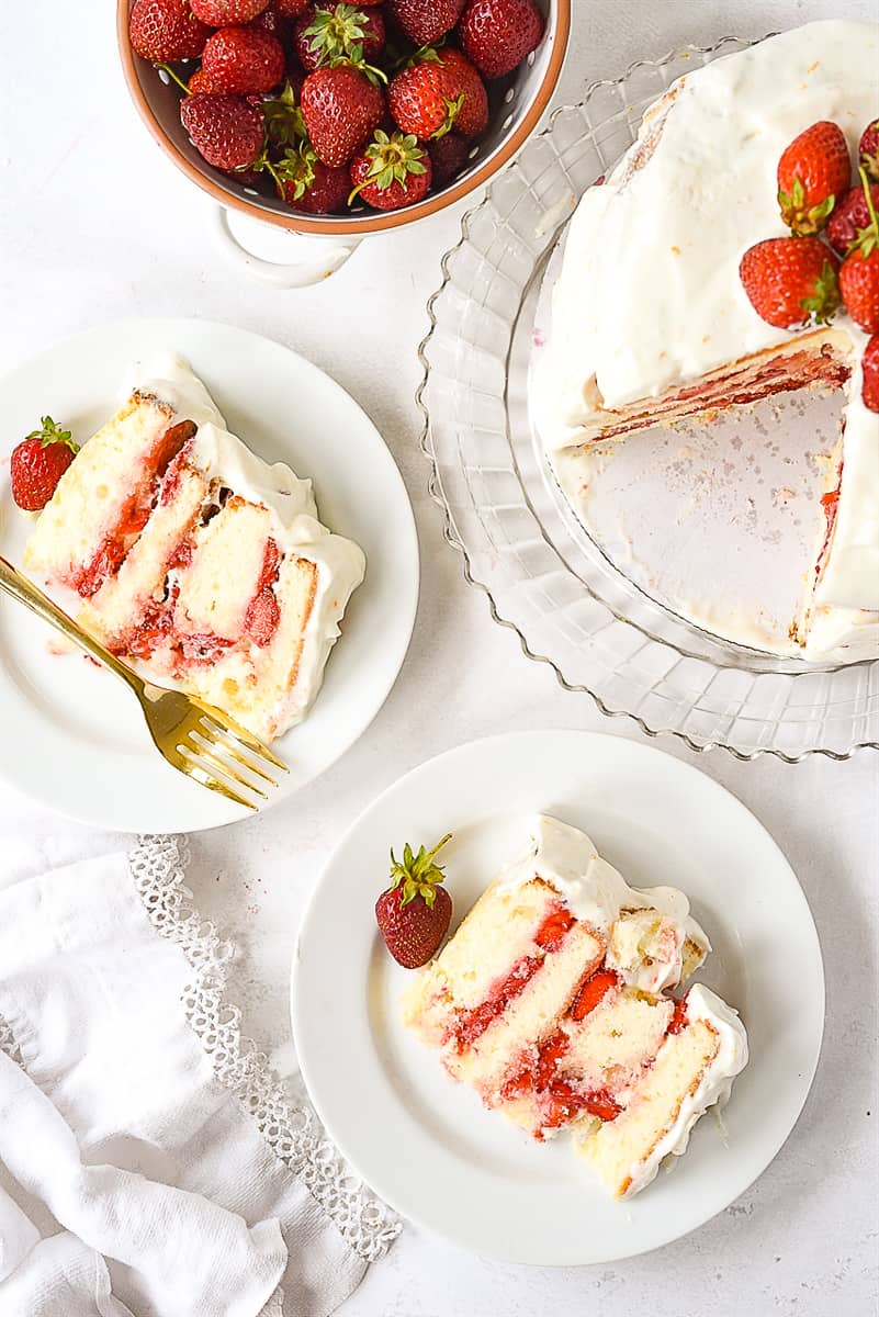 two slices of cake on plates.