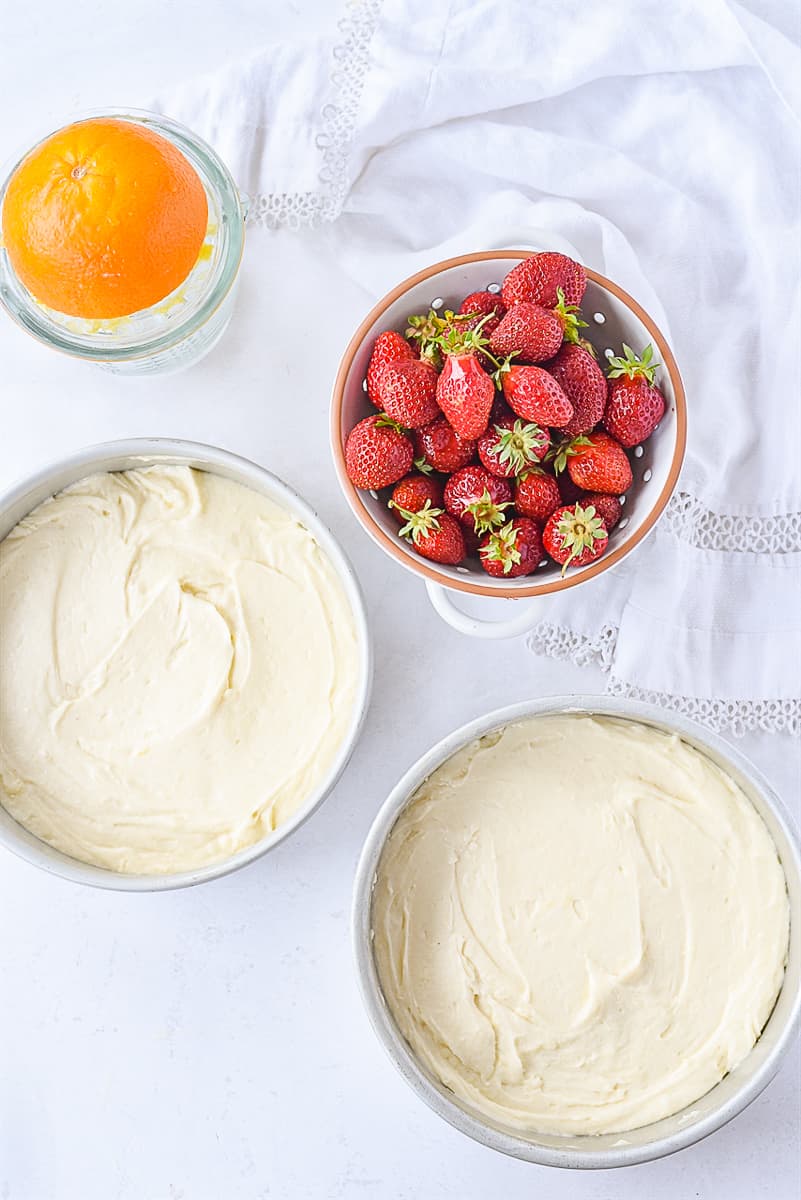 cake batter in cake pans