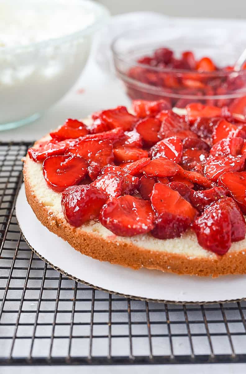 strawberries on top of cake layer