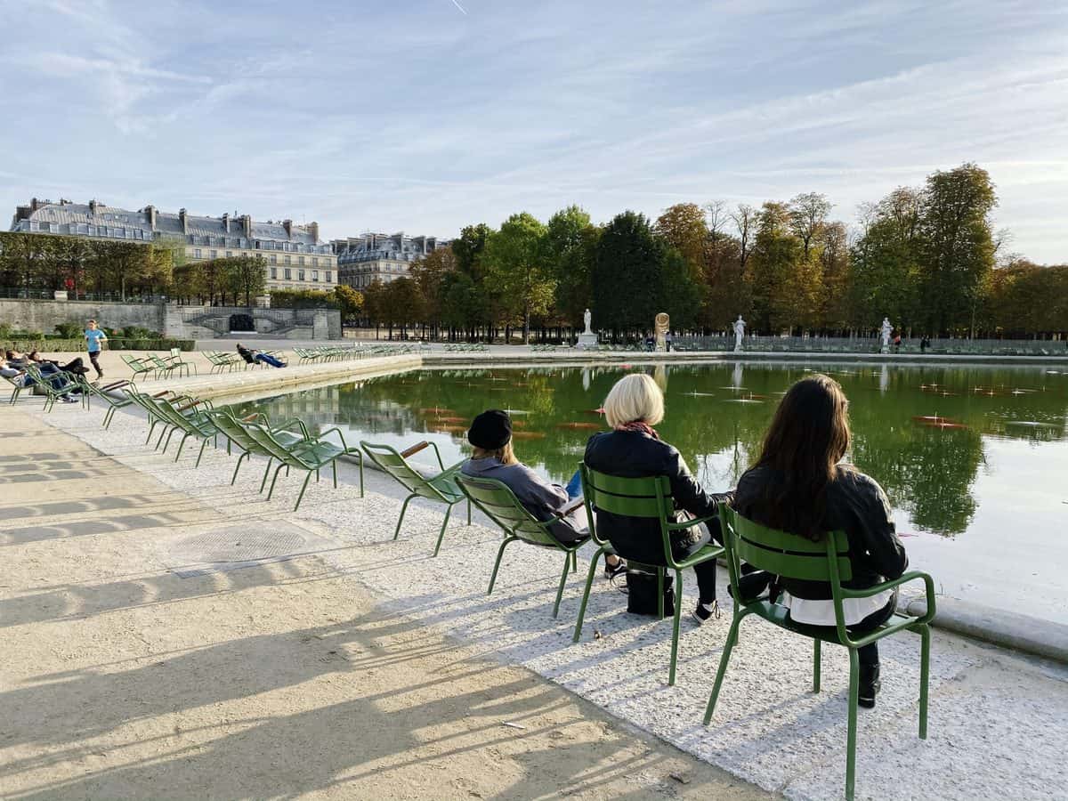 sitting in the tuileries gardens