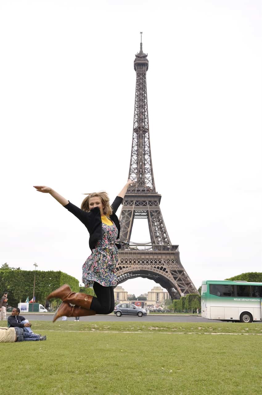 jumping n front of eiffel tower