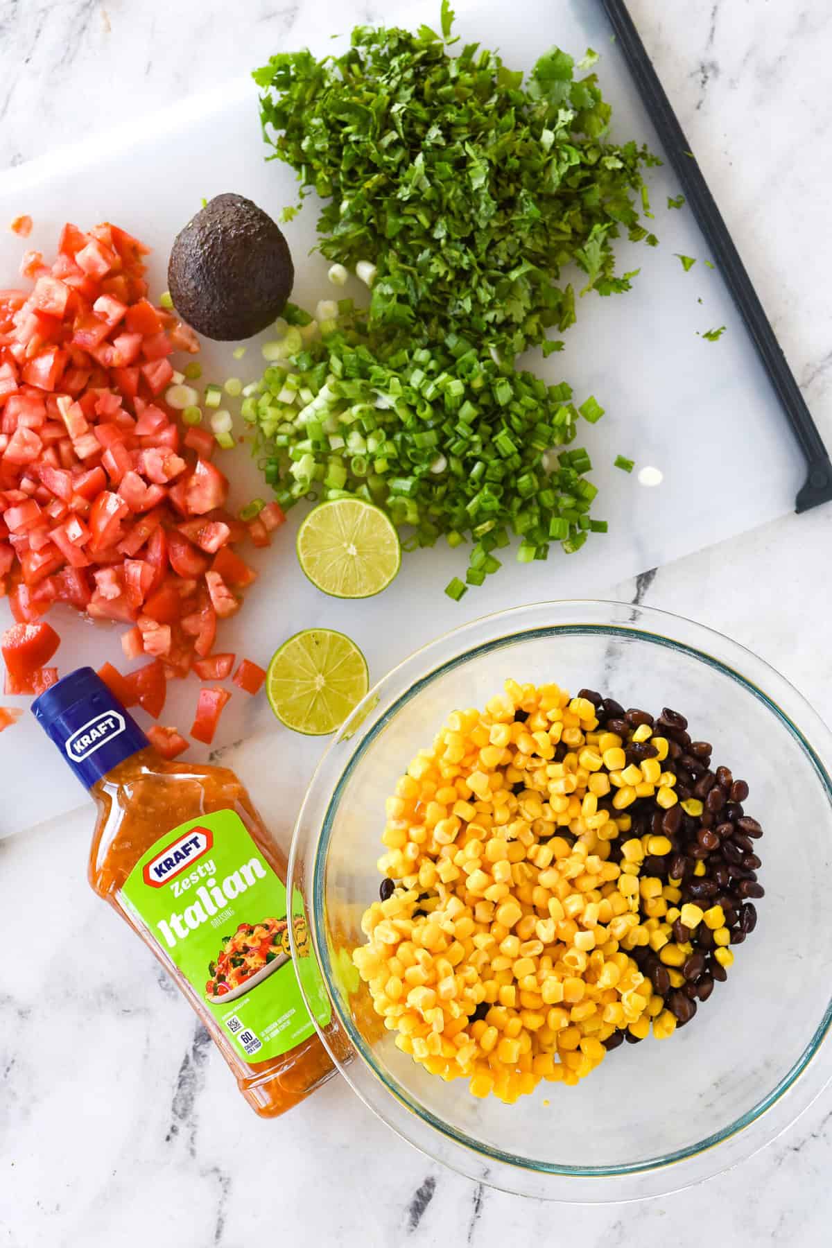 chopping veggies for cowboy caviar