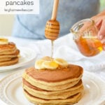 drizzling honey on pancakes