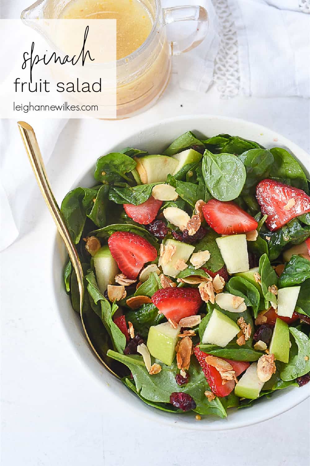 overhead shot of bowl of spinach salad