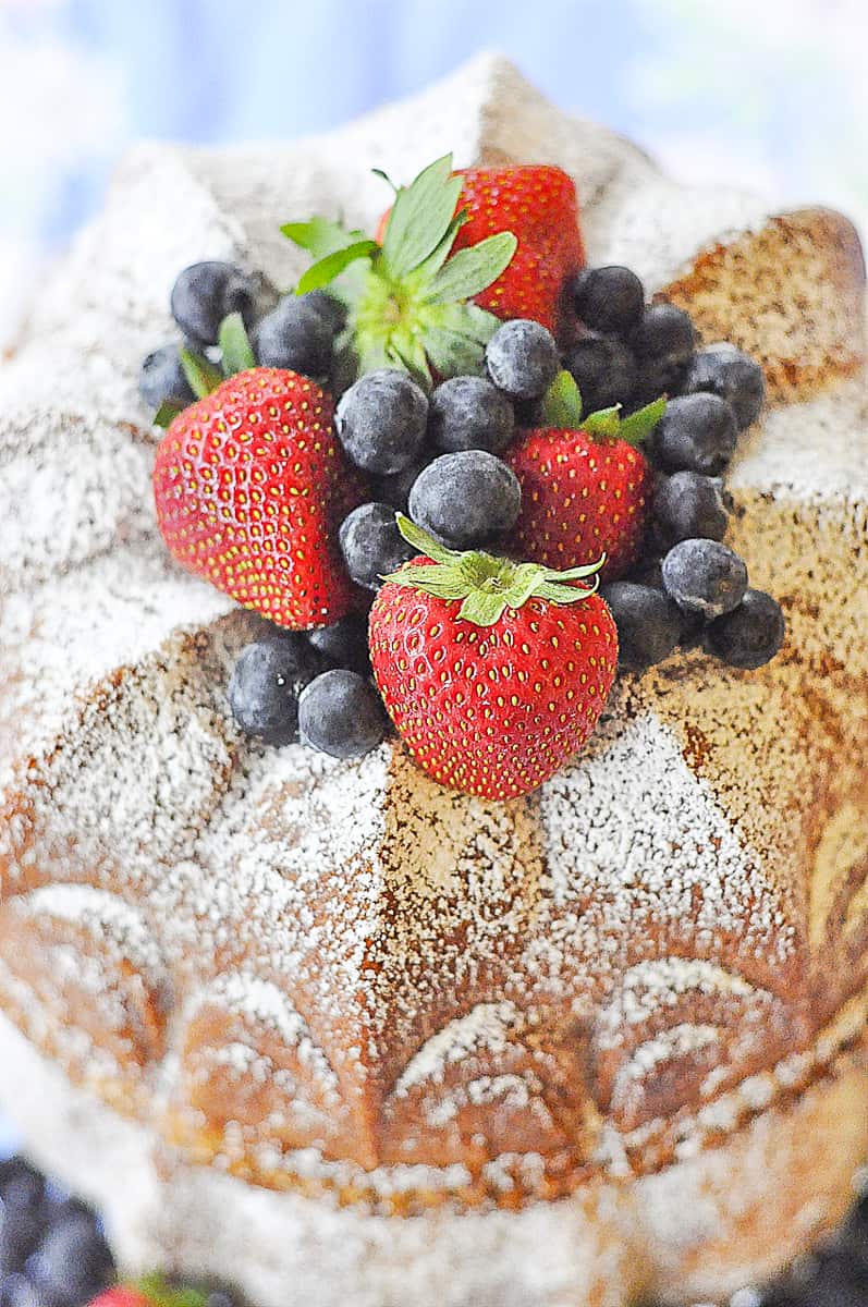 top of bundt cake with fruit