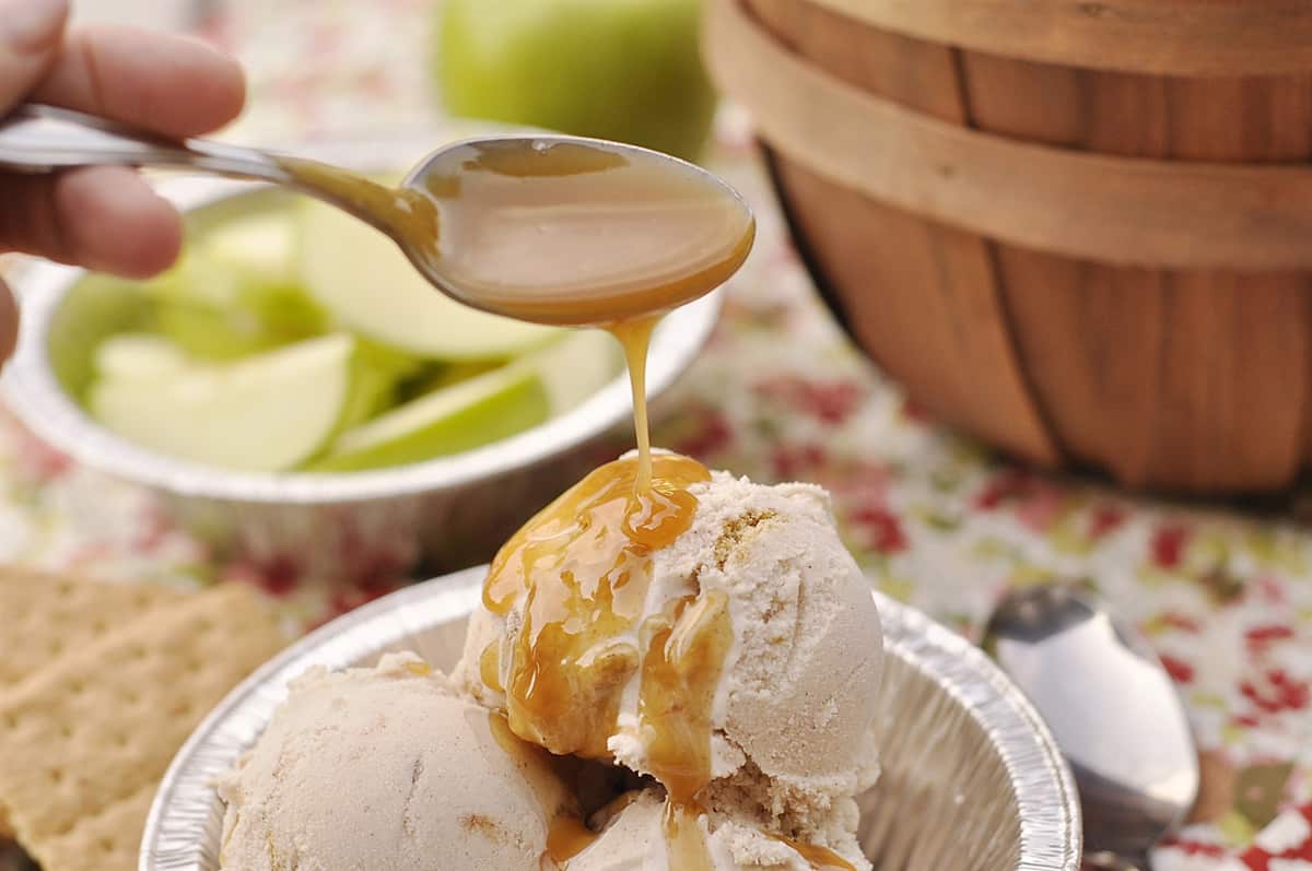 pouring caramel on ice cream