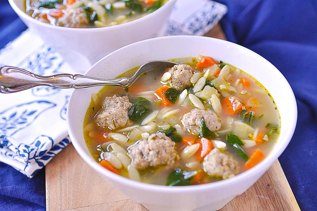 spoon in a bowl of italian wedding soup