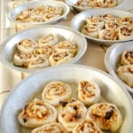 table full of cinnamon rolls