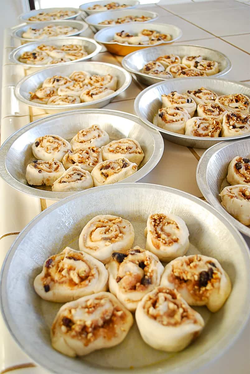 table full of cinnamon rolls