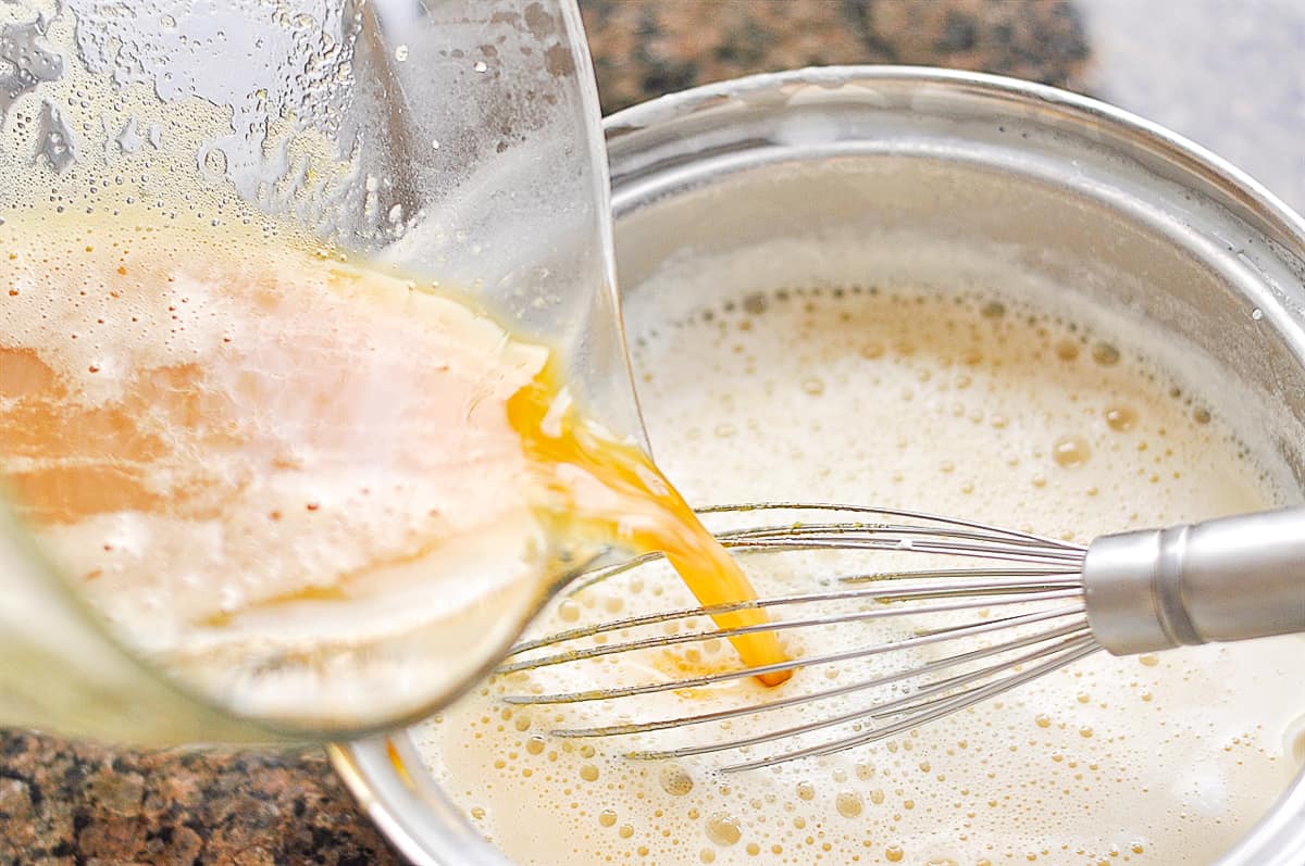 pouring egg mixture in