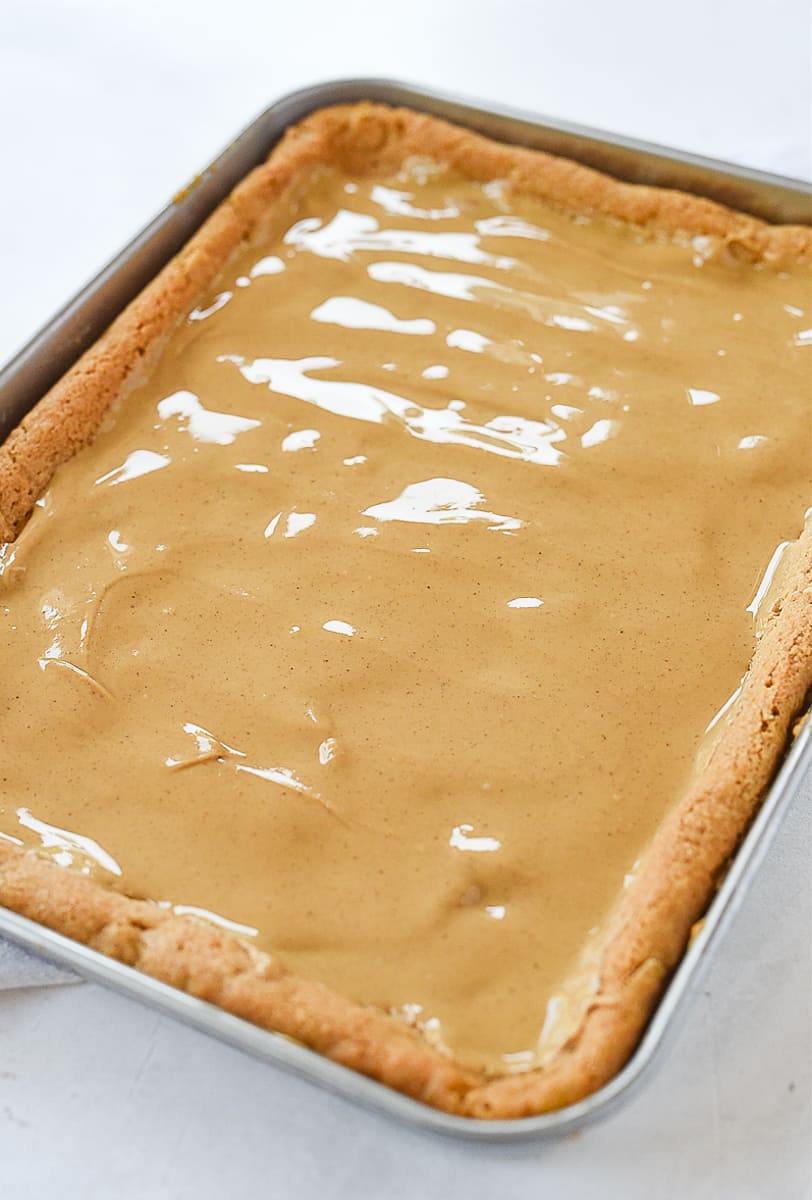 peanut butter spread over bars