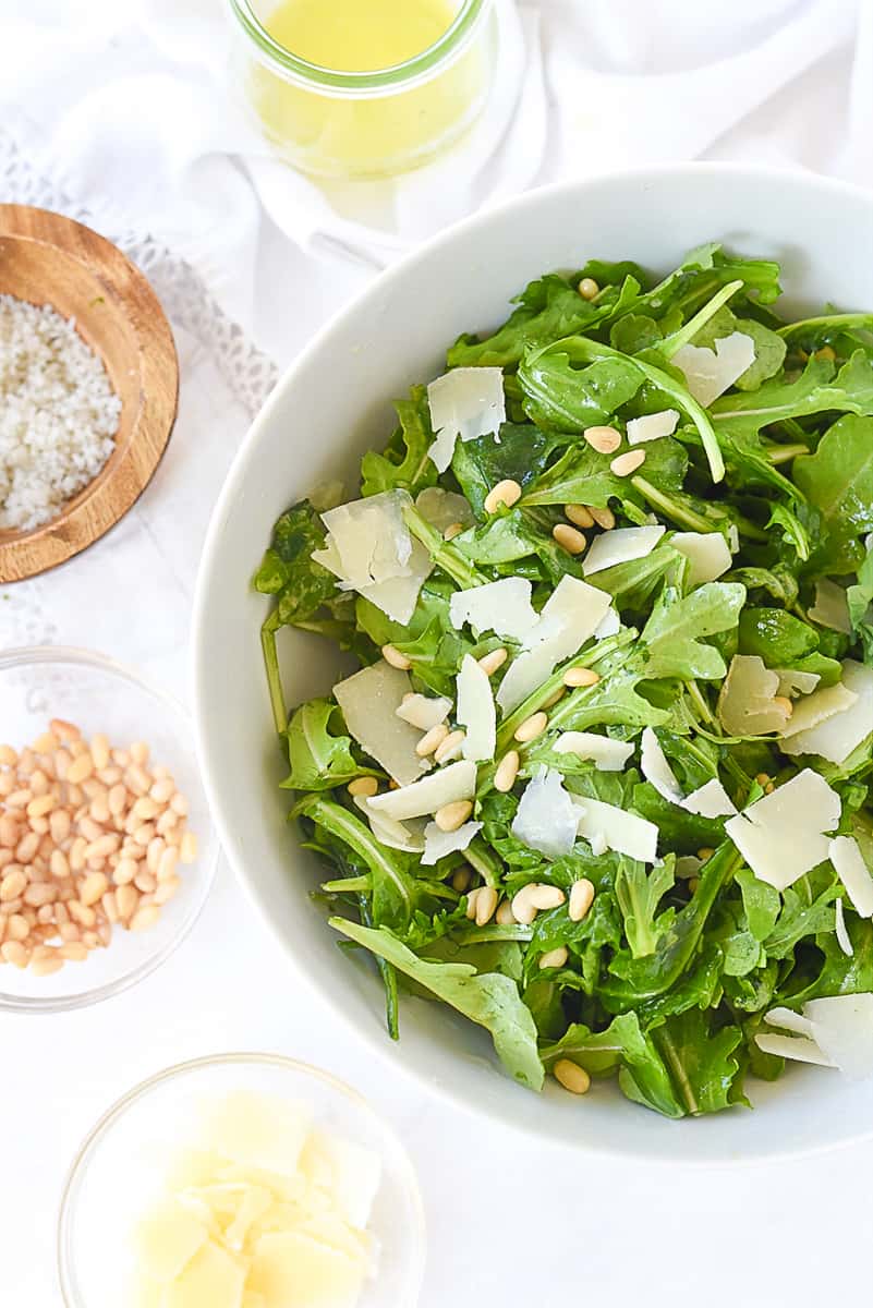 overhead shot of a simple arugula salad