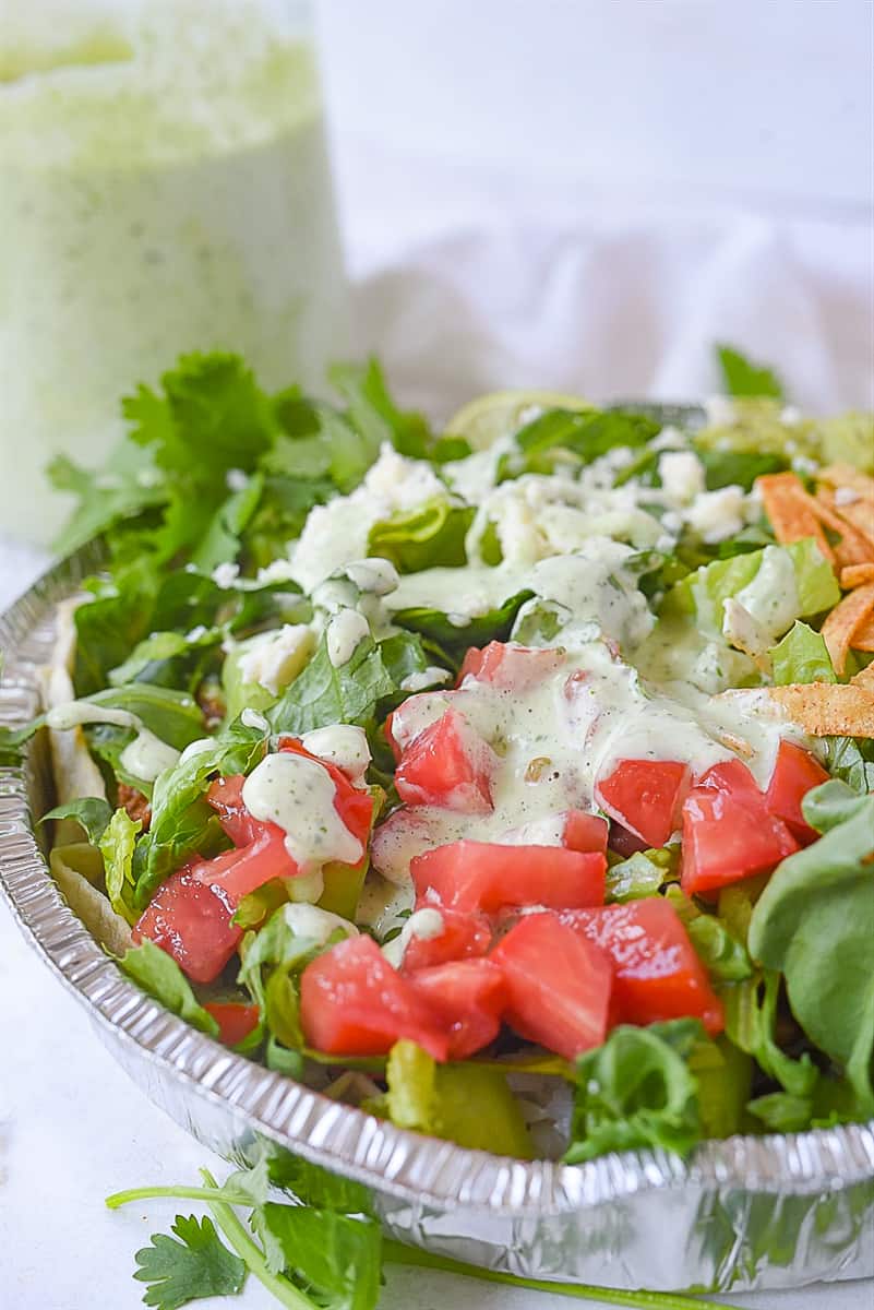 cafe rio salad in a metal tin