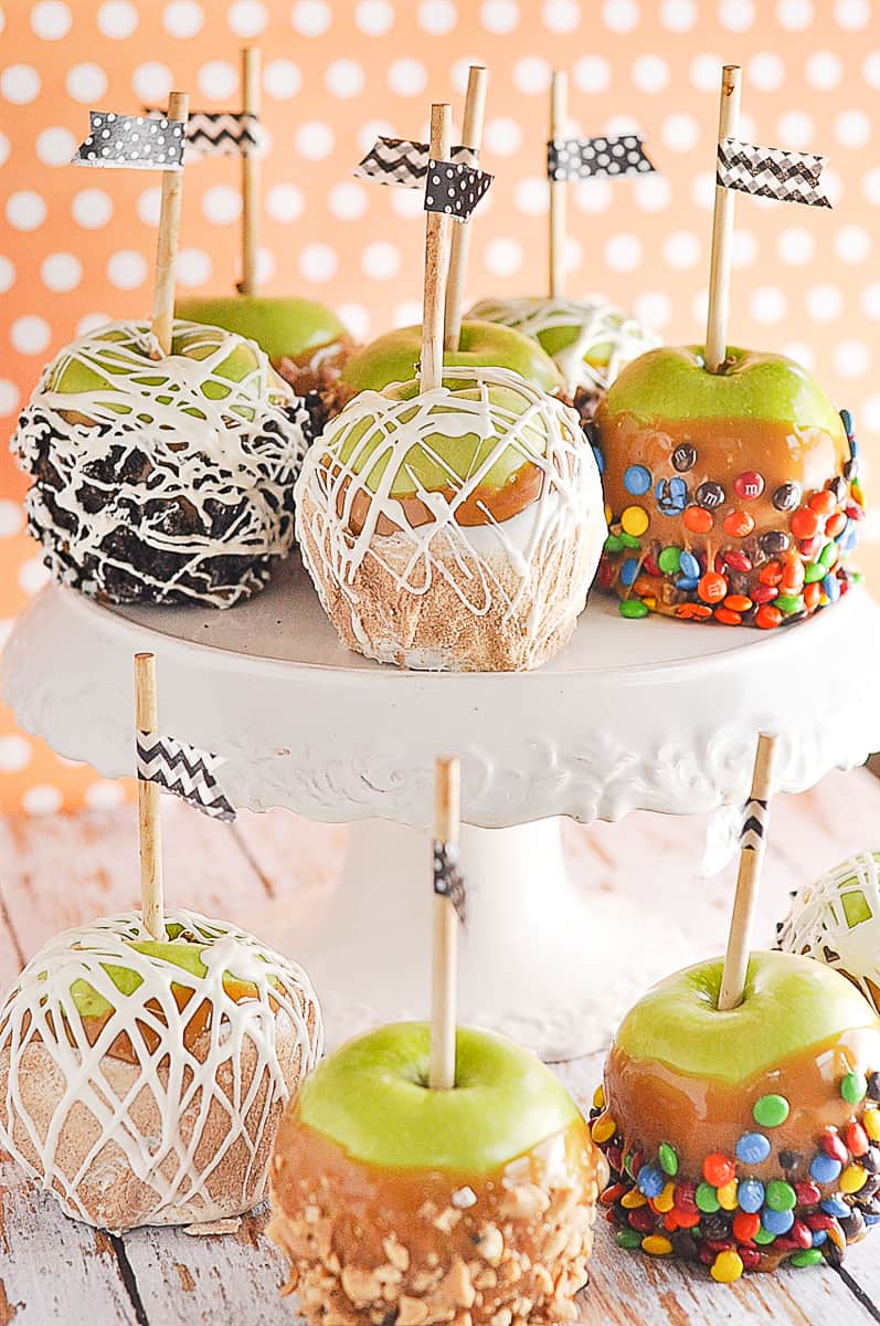 caramel apples on a cake plate