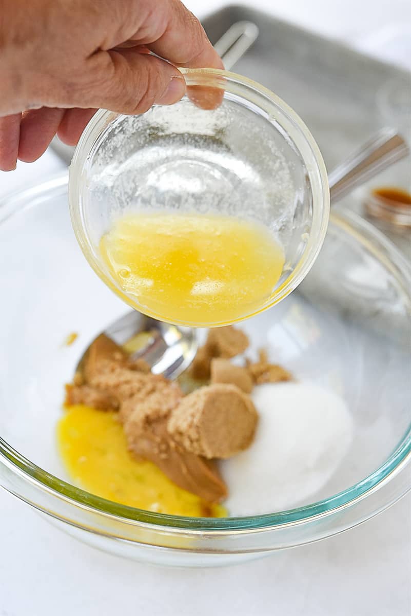 adding beaten egg to dough