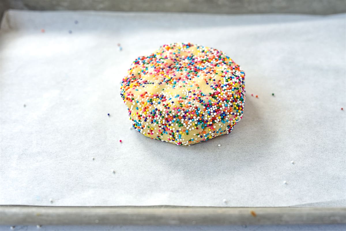 disc of cookie dough on baking sheet