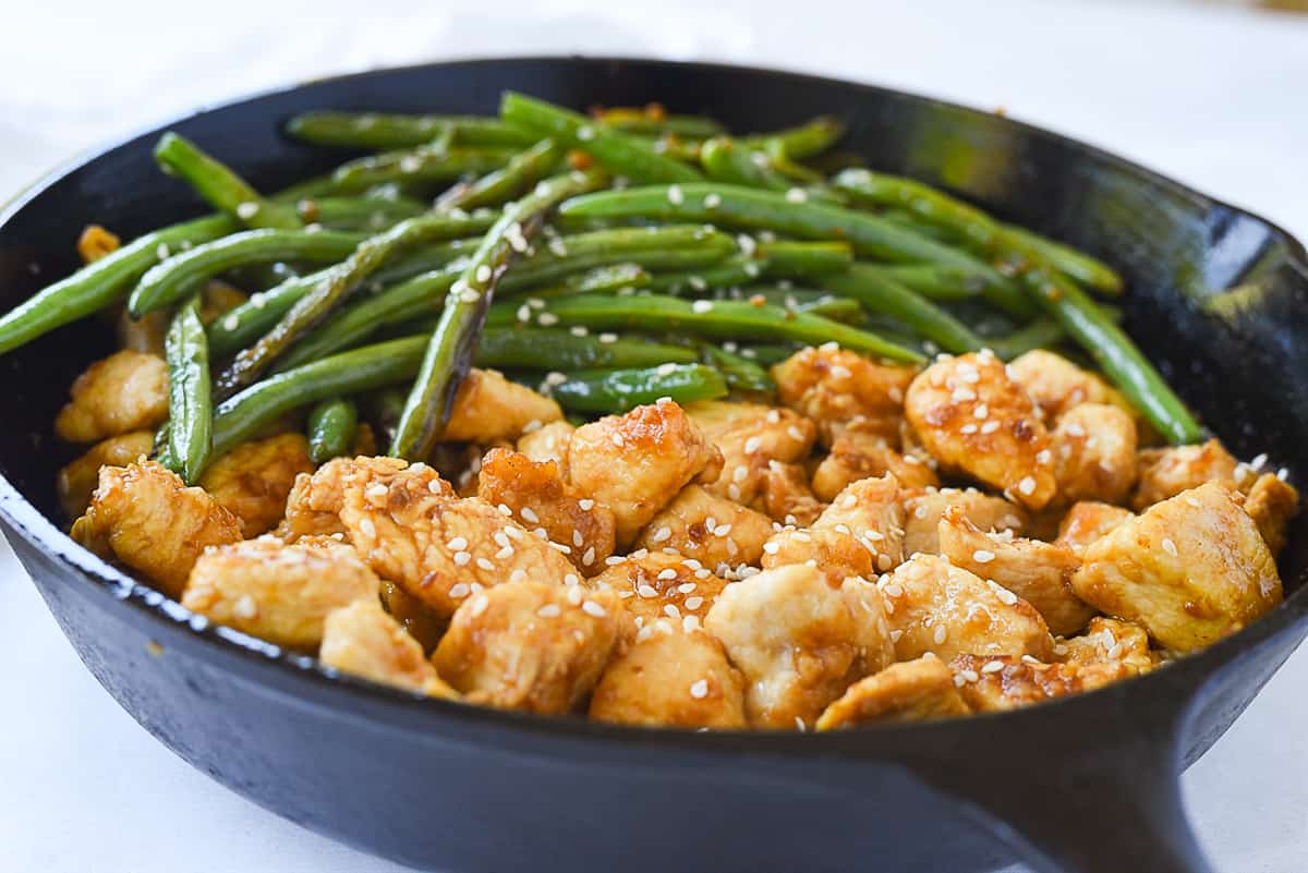 close up of chicken and green beans