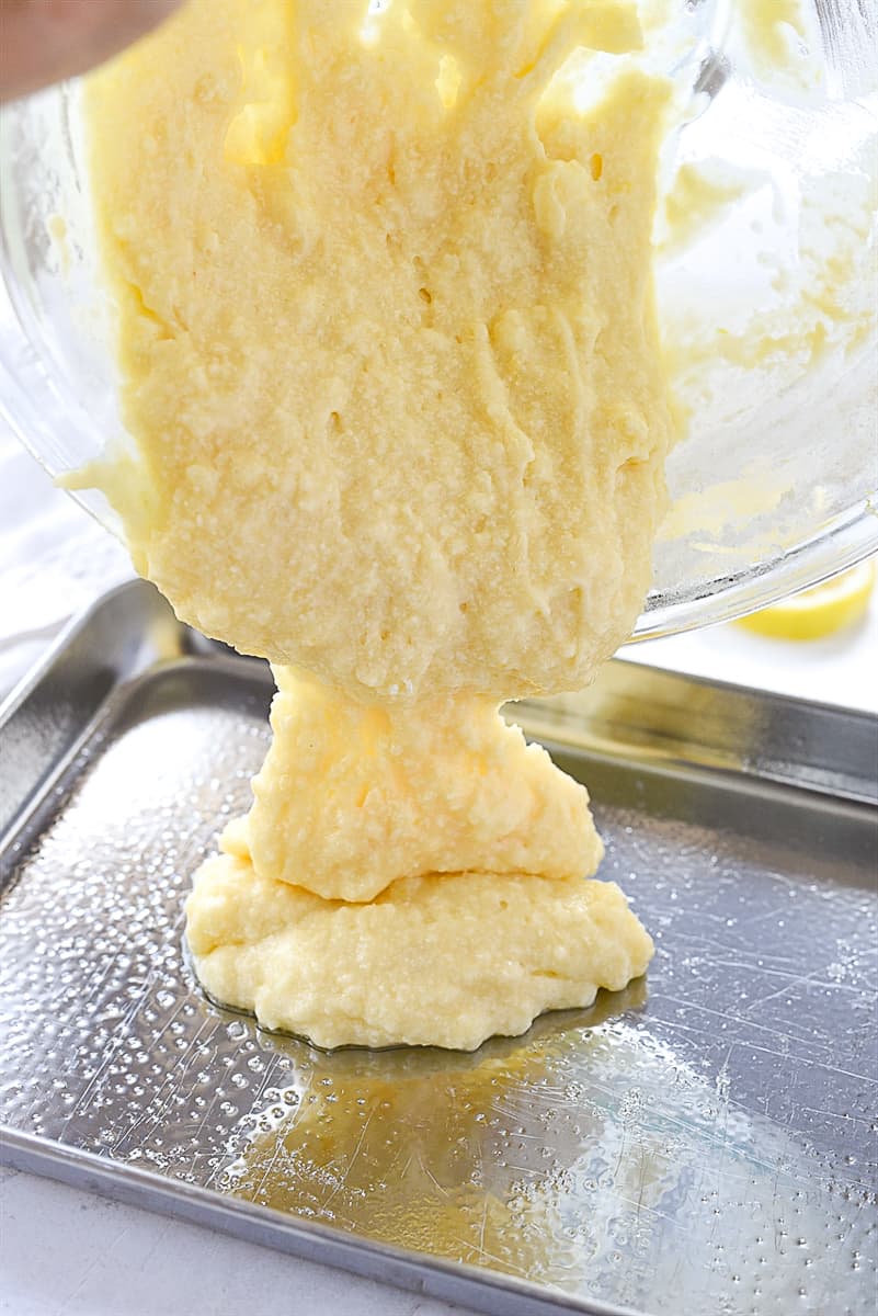 pouring batter into pan